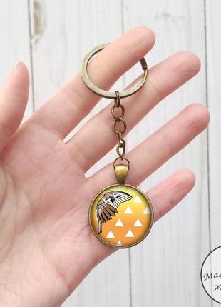 Брелок знак зеницу 1 из аниме клинок, рассекающий демонов