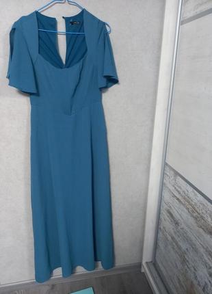 Корсетна сукня з розрізом1 фото