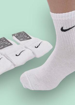 12 пар в упаковці шкарпетки середні білі nike 41-45р.1 фото