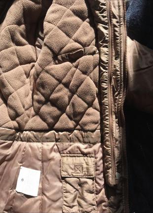 Зимова дитяча куртка коричневого кольору7 фото