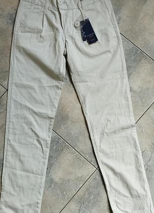 Нові штани,бежевого кольору