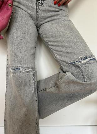 Серые клешоны джинсы швейцарского бренда idenim