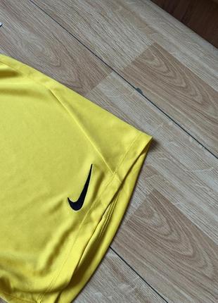 Нові оригінальні спортивні шорти nike3 фото