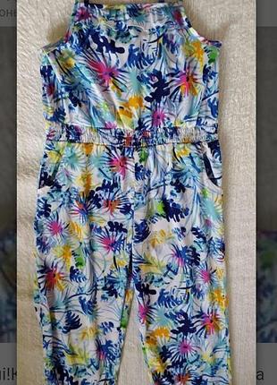 Красивый комбинезон с карманами на 9-10р.