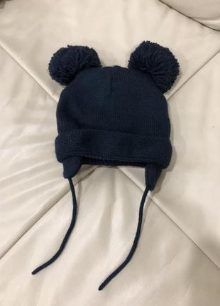 Тепла шапка на флісі з помпонами