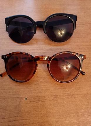 Женские солнцезащитные очки черного цвета и леопардовым принтом1 фото