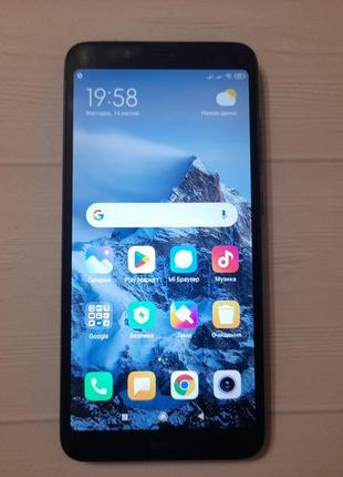 Смартфон xiaomi redmi 7a 2/32gb3 фото