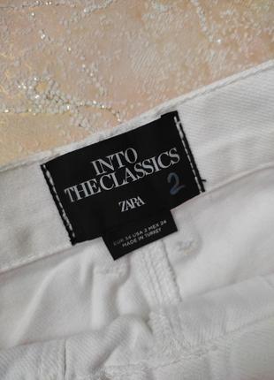 Белосежные джинсовые шорты с карманами5 фото