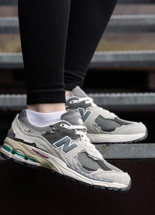 Стильные кроссовки хорошего качества в стиле new balance 2002r protection pack rain cloud grey6 фото