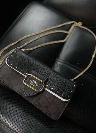 Практично нова сумка клатч coach оригінал coach signature colorblock with rivets morgan crossbody across-body bags1 фото