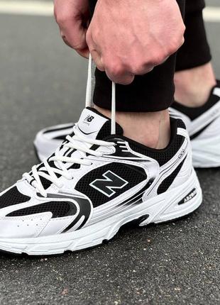 New balance кроссовки черно-белые в сетку 40-44р6 фото