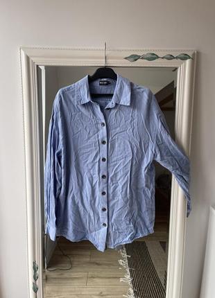Костюм голубой (шорты и рубашка)2 фото