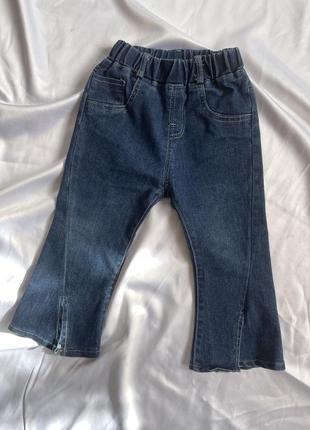 Кльошні джинси сині для дівчинки4 фото