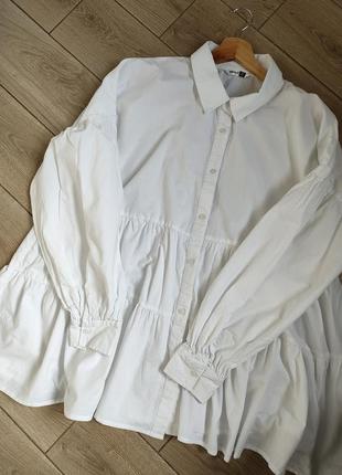 Белая женская рубашка с воланами1 фото