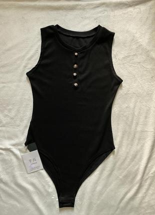 Новый боди чёрный с пуговицами в рубчик
