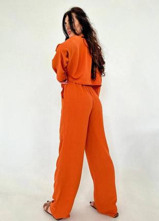Костюм укороченная рубашка свободного кроя рубашка с длинными рукавами брюки палаццо прямые брюки комплект розовый бежевый хаки белый оранжевый черный7 фото