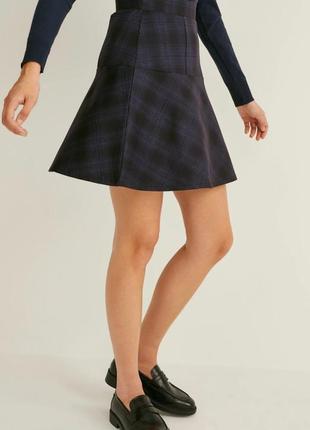 Брендовая расклешенная юбка из эластичного трикотажа c&a этикетка