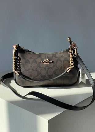 Coach teri shoulder bag in signature canvas1 фото