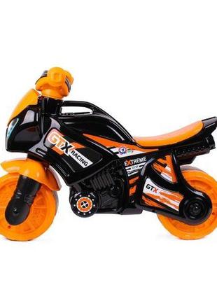 Каталка "мотоцикл технок" черно-оранжевый3 фото