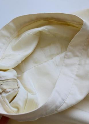 Стильная женская юбка молочного цвета длины миди7 фото