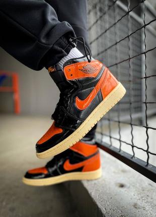 Чоловічі кросівки nike air jordan 1 retro high og "black/orange"1 фото