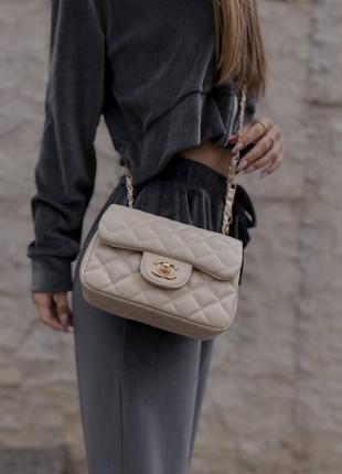 Женская сумка chanel 1.55 beige