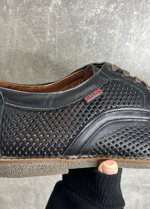 Мужские кожаные туфли в черном цвете с перфорацией5 фото