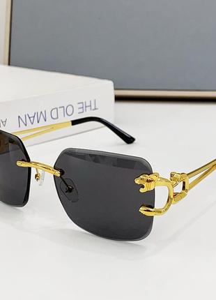 Солнцезащитные очки унисекс tiger без оправы черные с золотом3 фото