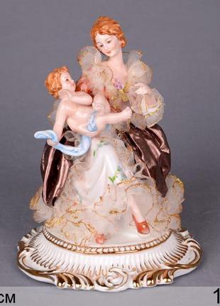 Фігурка декоративна "дама з дитиною", 19 см1 фото
