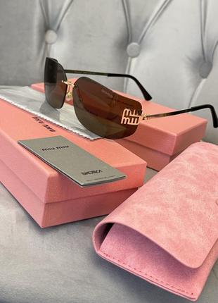 Солнцезащитные очки miu miu1 фото