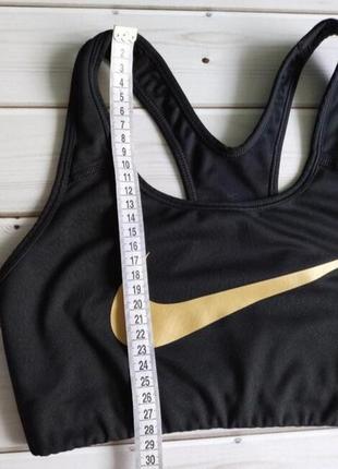 Топ nike pro classic swoosh gold bra8 фото