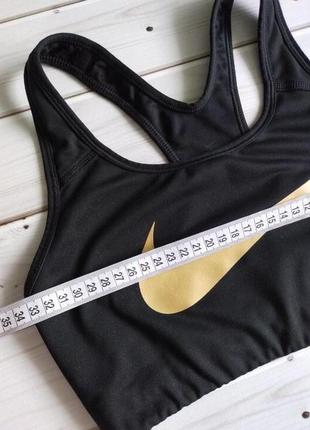 Топ nike pro classic swoosh gold bra7 фото