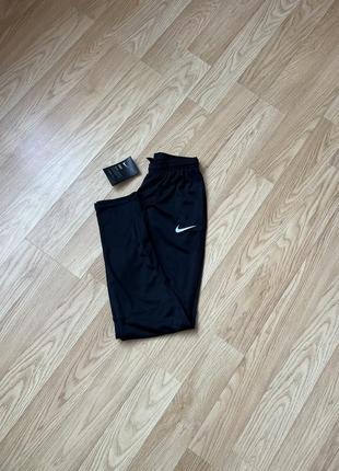 Нові чоловічі спортивні штани nike оригінал1 фото