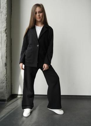 Дитячий підлітковий брючний костюм с лампасами в чорному кольорі для дівчинки 1402 фото