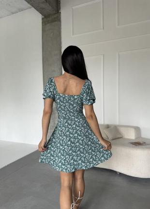 Жіноча літня сукня з декольте8 фото