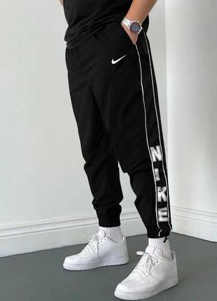Чоловічі чорні спортивні штани nike2 фото