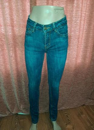 Джинси жіночі сині 26 р.