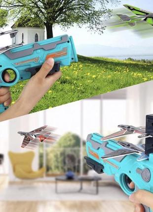 Детский игрушечный пистолет с самолетиками air battle катапульта с летающими самолётами4 фото