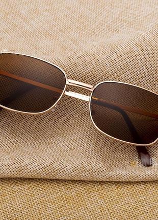 Солнцезащитные очки в металлической оправе унисекс1 фото