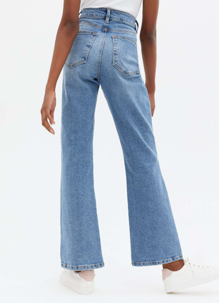 Трендовые, скраво голубые джинсы с высокой талией4 фото