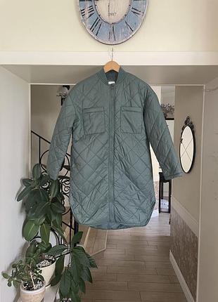 Подовжене стьобане пальто