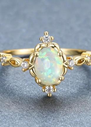 Винтажное новое колечко с искусственным опалом.