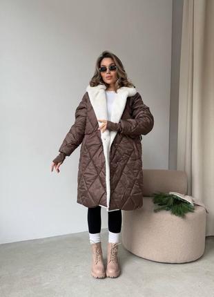 Довга зимова куртка