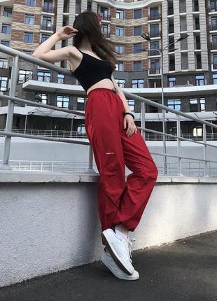 Красные спортивные штаны craft m