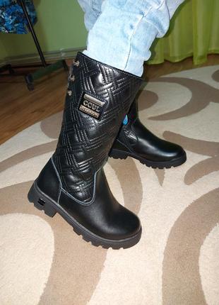 Чоботи високі