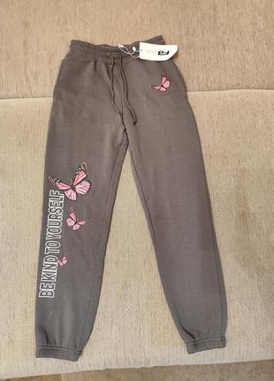 Штани спортивні теплі нові