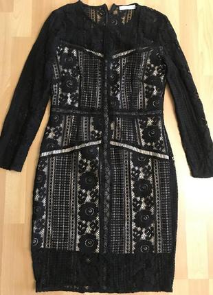 Чёрное платье reserved на бежевой подкладке.