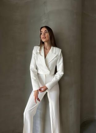 Брючный костюм пиджак и брюки клеш5 фото
