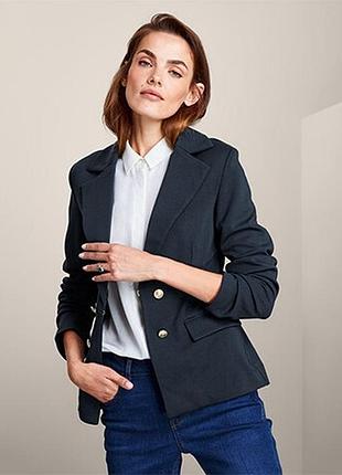 Жакет з еластичної тканини з декоративними гудзиками, розмір 46-48 (42 евро)