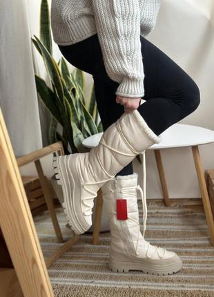 Высокие зимние сапоги